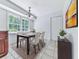 Charming dining area features a table with seating for four and natural light from nearby windows at 4307 Smithsonia Ct, Tucker, GA 30084
