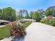 Charming single-story home with a well-manicured lawn, colorful landscaping, and an attached two-car garage at 4307 Smithsonia Ct, Tucker, GA 30084