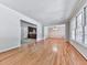 Spacious living room with hardwood floors, ample natural light, and open access to other living areas at 4307 Smithsonia Ct, Tucker, GA 30084