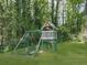Backyard playground set with swings and a fort at 4307 Smithsonia Ct, Tucker, GA 30084