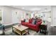 Inviting living room with dark floors, bright walls, an area rug and stylish furniture at 1084 Regent Sw St, Atlanta, GA 30310