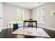 Home office featuring hardwood floors, natural light, and neutral walls at 1084 Regent Sw St, Atlanta, GA 30310