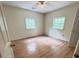 Cozy bedroom featuring with hardwood flooring and well-lit windows at 1794 Blossom Ln, Austell, GA 30168