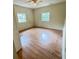 Cozy bedroom featuring with hardwood flooring and well-lit windows at 1794 Blossom Ln, Austell, GA 30168