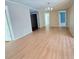 Spacious and well-lit living room featuring hardwood flooring and neutral color palette at 1794 Blossom Ln, Austell, GA 30168