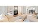Cozy living room featuring neutral walls, a fireplace, and hardwood floors at 200 High Creek Dr, Roswell, GA 30076