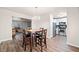 Open-concept living room featuring a dining area and an updated kitchen at 200 High Creek Dr, Roswell, GA 30076