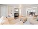 Inviting living room with hardwood flooring, fireplace, and staircase access at 200 High Creek Dr, Roswell, GA 30076