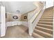 Finished basement with built-in cabinets and staircase at 562 Grassmeade Way, Snellville, GA 30078