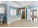 Bathroom featuring a soaking tub, separate shower, and large window at 562 Grassmeade Way, Snellville, GA 30078