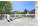 Outdoor deck perfect for entertaining with picturesque backyard view at 562 Grassmeade Way, Snellville, GA 30078