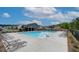 Community pool with lounge chairs and cabana perfect for relaxing at 1543 Dover Creek Ln, Lawrenceville, GA 30045