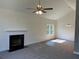 Open-concept living room with modern fireplace and bright, airy windows at 202 Gamel Rd, Dallas, GA 30157