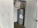 A water heater in a closet is displayed, showcasing the home's utilities at 202 Gamel Rd, Dallas, GA 30157