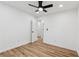 A bright bedroom showcases wood-look floors and a modern ceiling fan at 290 Magnolia Walk Ln, Atlanta, GA 30349