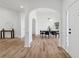Elegant dining area with hardwood floors, a modern chandelier, and an open layout that is perfect for entertaining at 290 Magnolia Walk Ln, Atlanta, GA 30349