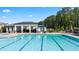 Pool with clearly marked swimming lanes, grilling area, lots of shade and space to lounge for the residents at 315 Silver Moon Dr, Loganville, GA 30052
