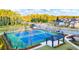 View of well-maintained tennis courts, perfect for enjoying an active lifestyle within the community at 315 Silver Moon Dr, Loganville, GA 30052