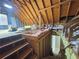 View of unfinished attic with stair access at 5668 Blanchard Pl, Sugar Hill, GA 30518