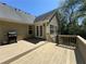 Back deck with outdoor grill, perfect for entertaining guests at 5668 Blanchard Pl, Sugar Hill, GA 30518