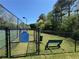 Fenced-in dog park area with a bench and dog park rules clearly displayed at 5668 Blanchard Pl, Sugar Hill, GA 30518