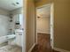 Bathroom view to hallway and bedroom at 5668 Blanchard Pl, Sugar Hill, GA 30518