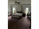 Bright main bedroom boasts a tray ceiling and well-lit windows at 9290 Prestwick Club Dr, Johns Creek, GA 30097