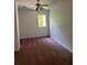 Bedroom with a ceiling fan and natural light from a window at 9290 Prestwick Club Dr, Johns Creek, GA 30097