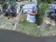 Stunning aerial view of the home featuring a pool and waterfront access on a large lot at 140 N Lakeside Nw Dr, Kennesaw, GA 30144