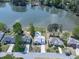 Overhead shot of beautiful homes near the lake, showcasing mature trees and well-kept yards at 140 N Lakeside Nw Dr, Kennesaw, GA 30144