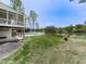 Backyard features a screened porch, patio area, and lake access, enhancing outdoor enjoyment at 140 N Lakeside Nw Dr, Kennesaw, GA 30144