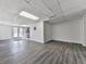 Large finished basement area with white walls and a walkout to the exterior at 140 N Lakeside Nw Dr, Kennesaw, GA 30144