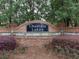 Elegant brick entrance sign for Chastain Lakes, surrounded by manicured landscaping, creating a welcoming atmosphere at 140 N Lakeside Nw Dr, Kennesaw, GA 30144