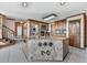 Kitchen featuring granite countertops, stainless steel appliances, and decorative tile details at 140 N Lakeside Nw Dr, Kennesaw, GA 30144