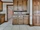 Kitchen featuring wood cabinets, granite countertops and decorative backsplash tile at 140 N Lakeside Nw Dr, Kennesaw, GA 30144