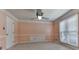 Empty room offers neutral wall color, baseboard, trim and a window with closed blinds at 140 N Lakeside Nw Dr, Kennesaw, GA 30144