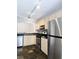 Kitchen featuring stainless steel appliances, tile backsplash, and light wood cabinetry at 1490 N Crossing Circle Ne Cir # 1490, Atlanta, GA 30329