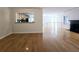 Spacious living area boasts hardwood floors, open concept design, and stylish railings overlooking the fireplace at 1490 N Crossing Circle Ne Cir # 1490, Atlanta, GA 30329