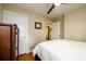 Cozy bedroom with hardwood floors, neutral paint, ceiling fan, and a closet at 2724 Parkwood Se Rd, Smyrna, GA 30080