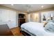 Bedroom with ensuite bathroom, closet, wood dresser, and two large windows allowing ample sunlight at 2724 Parkwood Se Rd, Smyrna, GA 30080