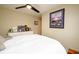 Bright and spacious bedroom with a large dresser and a black ceiling fan at 2724 Parkwood Se Rd, Smyrna, GA 30080