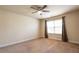 Bedroom with neutral walls, carpeted floor, and windows with curtains providing natural light and style at 3880 Deer Run Dr, Cumming, GA 30028