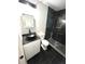 Modern bathroom featuring stone countertop vanity, stylish vessel sink and tiled shower at 6125 Connell Rd, Atlanta, GA 30349