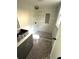 Bathroom featuring a decorative vessel sink and a tiled shower with niche at 6125 Connell Rd, Atlanta, GA 30349