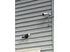 Exterior view of a home's siding with security lights and a security camera at 6125 Connell Rd, Atlanta, GA 30349