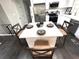 Modern kitchen island with stylish seating, perfect for casual dining and entertaining at 6125 Connell Rd, Atlanta, GA 30349