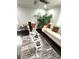 Bright living room featuring contemporary furniture, hardwood floors, and tasteful decorative elements at 6125 Connell Rd, Atlanta, GA 30349