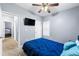 Cozy bedroom with plush carpeting, a ceiling fan, and lots of natural light at 650 Ira Sw St, Atlanta, GA 30312