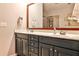 Bathroom features a double sink vanity with a large mirror, drawers, and a shower at 2250 W Village Junction Se Way, Smyrna, GA 30080
