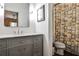 Bathroom features a marble vanity and countertop, and a shower behind a decorative shower curtain at 2250 W Village Junction Se Way, Smyrna, GA 30080